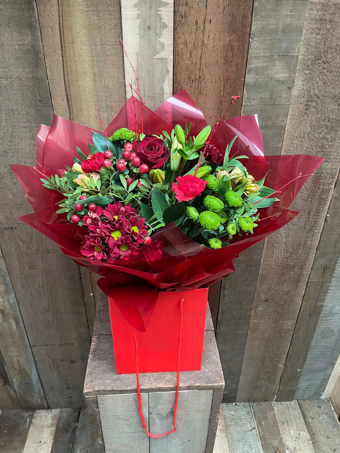 Festive Flowers - Red & Orange Hand Tied Arrangement